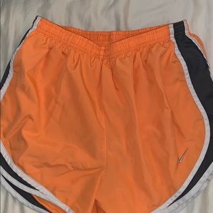 Orange running shorts